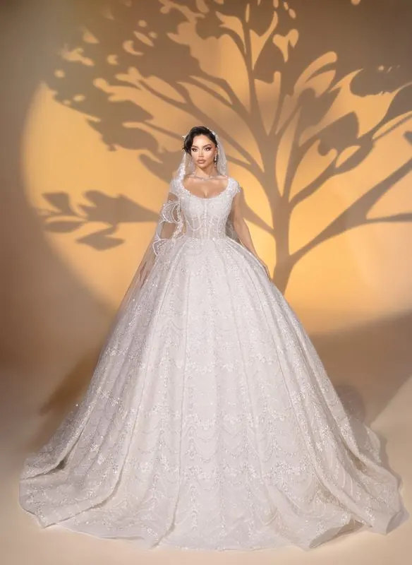 Bridal gown in the studio with tree shadows