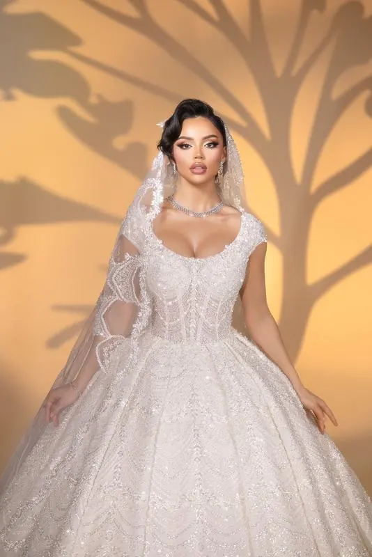 Bridal gown in the studio with tree shadows