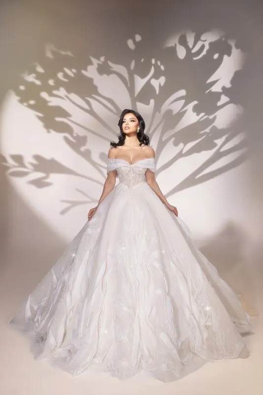 Bridal gown in the studio with tree shadows