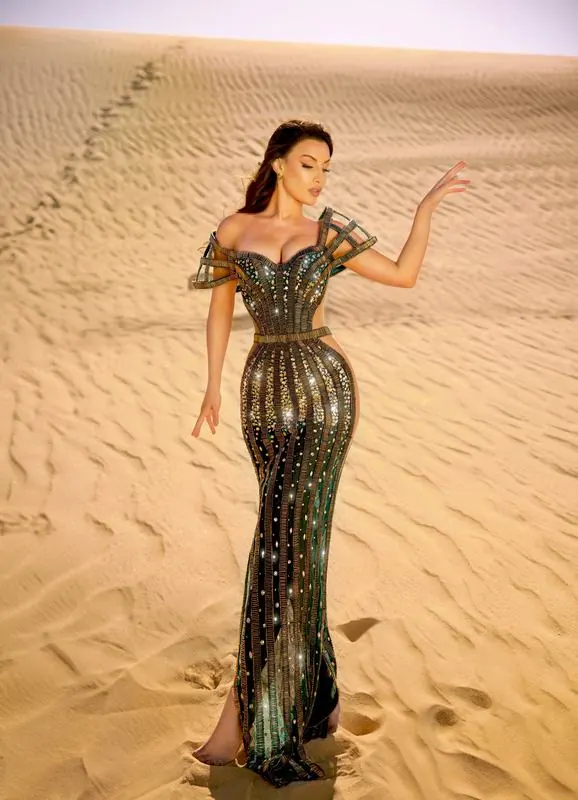 Gold sculpted gown on the sand dunes
