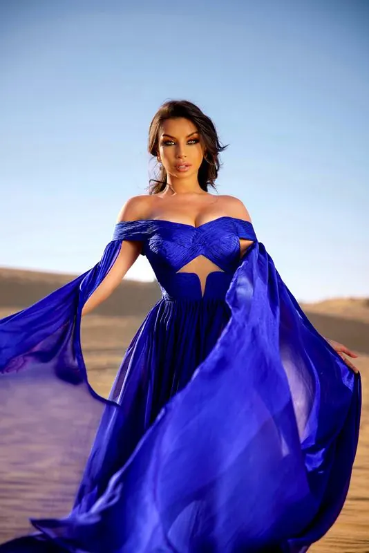 Cobalt silk gown in the wind