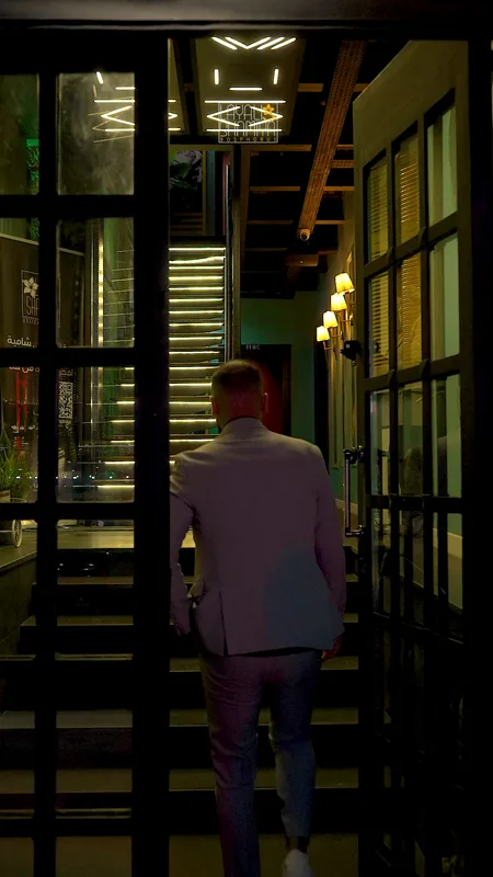 A guest walking into the restaurant