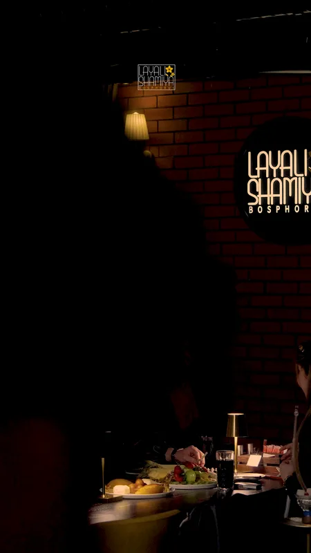 The Layali Shamiya sign in the dining room