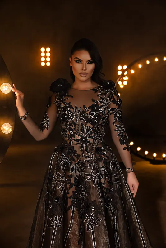 Black lace gown with long sleeves