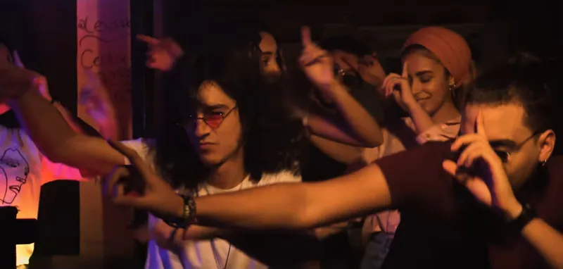 Friends dancing in the bar
