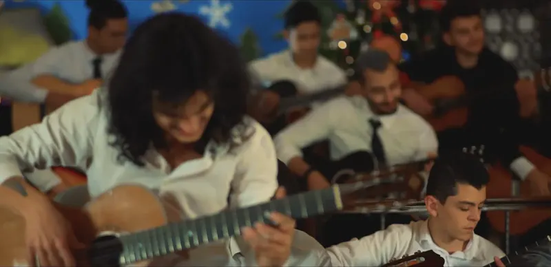 Guitarists in white shirts and ties
